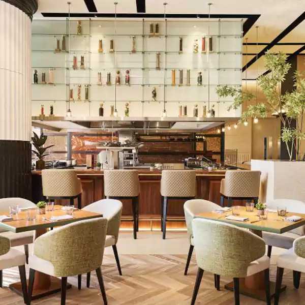 TAMISé 空间,将茶室与 “图书馆” 概念跨界融合,书架上的艺术书籍与茶具相映成趣 TAMISé 空间,将茶室与 “图书馆” 概念跨界融合,书架上的艺术书籍与茶具相映成趣